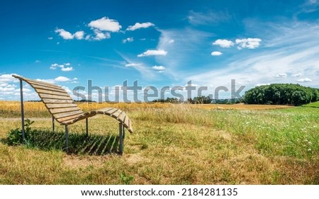 Saarland, Sankt Wendel, Germany - Relax bench on a premium hiking trail with views of the Saarland landscape
 Royalty-Free Stock Photo #2184281135