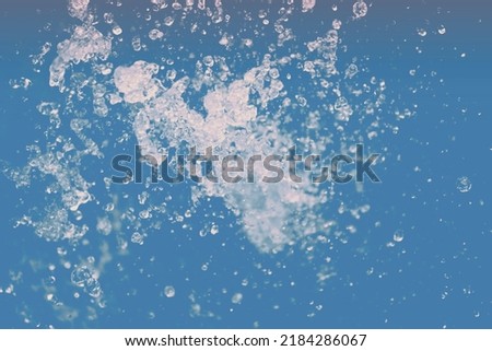 Water Splash on blue background.
