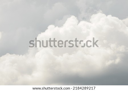 White big fluffy clouds. Natural scenic abstract background. Weather changes backdrop. Sky filled with voluminous clouds. Royalty-Free Stock Photo #2184289217