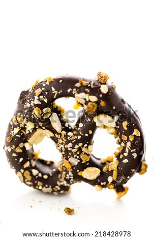 Gourmet chocolate covered pretzel on a white background.