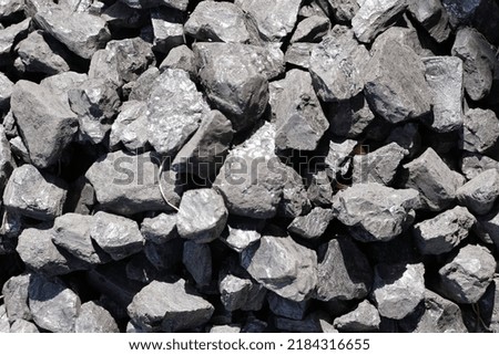 black coal pile Bituminous Lignite Royalty-Free Stock Photo #2184316655