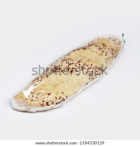 White Baguette in plastic packaging Artisan Sourdough Bread Bakery