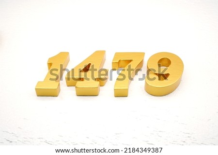    Number 1479 is made of gold painted teak, 1 cm thick, laid on a white painted aerated brick floor, visualized in 3D.                               
