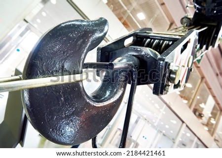 Heavy crane hook on a truck on exhibition