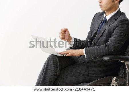 Businessman sealing his first deal and does fist pumps