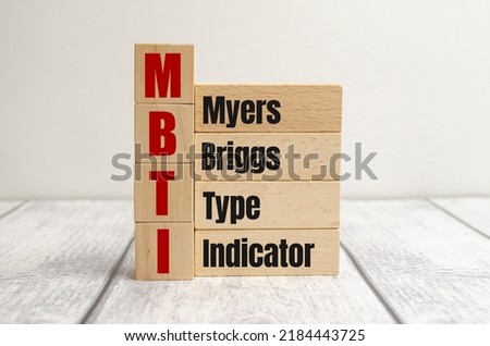 MBTI - word written on wooden blocks. text is written in black letters