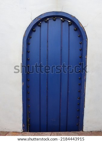 A Blue Wood Door Pattern Texture in Bumi Merapi Yogyakarta