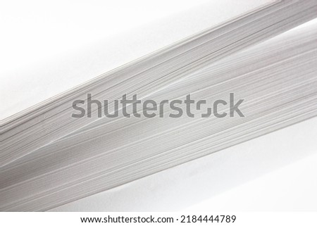 The White sheets of paper.Stationery paper. Folded packing sheets.Office stationery. Paper for printing, drawing, writing.