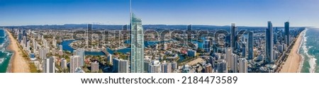 Panoramic aerial drone view of the iconic Gold Coast Beach at Surfers Paradise on the Gold Coast of Queensland, Australia on a sunny day 