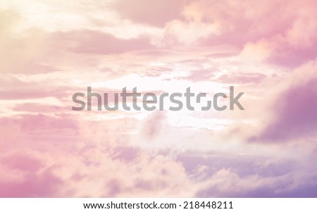 A soft cloud background with a pastel colored orange to blue gradient. Royalty-Free Stock Photo #218448211