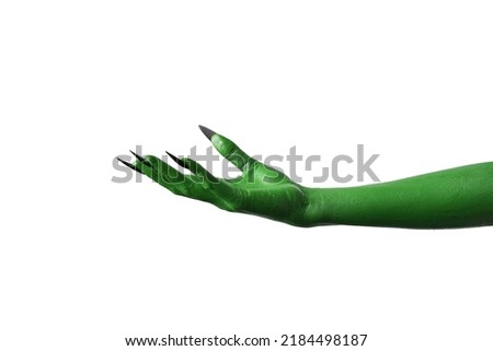 Halloween green color of witches, evil or zombie monster hand isolated on white background. Royalty-Free Stock Photo #2184498187