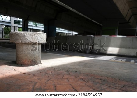 Concrete Pin Barrier with Light Beam.