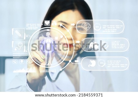 Asian woman doctor using stethoscope with futuristic technology health icon , health care concept