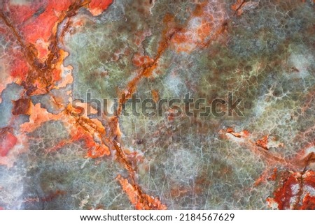 Real stone luxury bright orange green and yellow spots marble pattern texture macro
