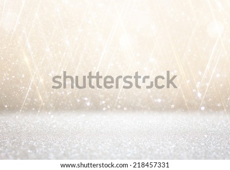 white and silver abstract bokeh lights. defocused background  Royalty-Free Stock Photo #218457331