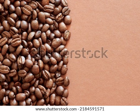 coffee beans. roasted coffee beans on brown background