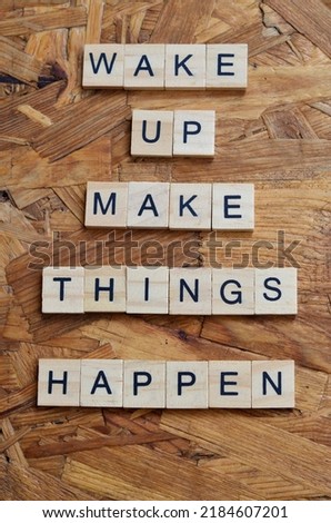 wake up make things happen text on wooden square, motivation and business quotes