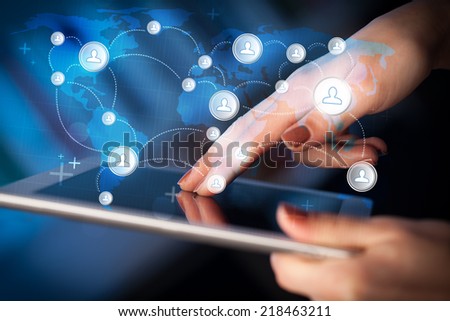 Finger pointing on tablet pc, social network concept