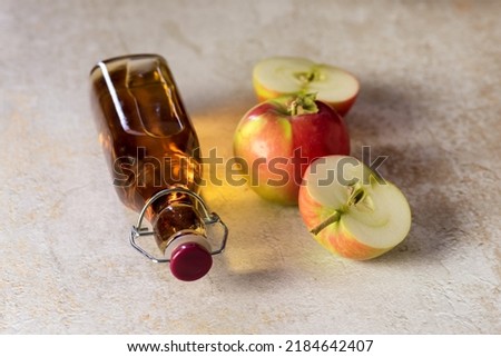 Glass Bottle with Apple Vinegar and Apple on Concrete Background Horizontal Harvest Autumn