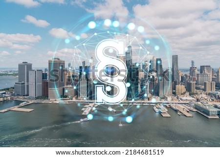 Aerial panoramic helicopter city view on Lower Manhattan district and financial Downtown, New York, USA. Glowing hologram legal icons. The concept of law, order, regulations and digital justice
