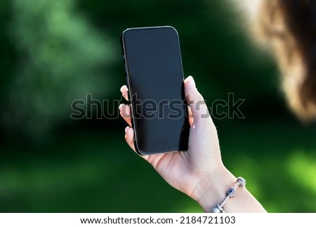 Woman use the iPhone with white screen