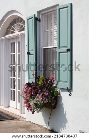 Downtown Charleston window box flowers Royalty-Free Stock Photo #2184738437