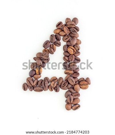 Number 4 made from coffee beans. Coffee font. Alphabet made from coffee beans. White background. Roasted coffee beans.