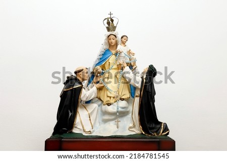 Statue of the image of Our Lady of Rosary Pompeii with baby Jesus, Saint Dominic of Gusmao and Saint Catherine of Seine - Nossa Senhora do Rosario de Pompeia Royalty-Free Stock Photo #2184781545