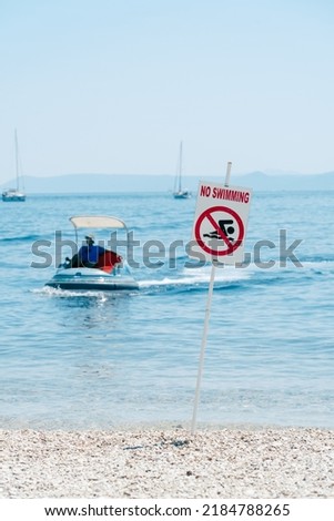 A sign on the beach is not allowed to swim! 