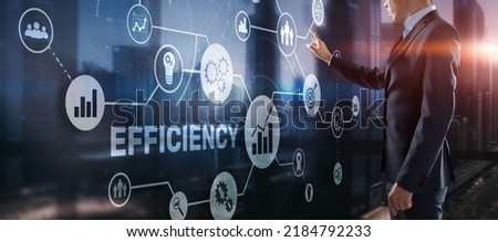 Efficiency. Businessman presses the inscription on the virtual screen Royalty-Free Stock Photo #2184792233