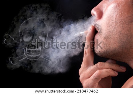 Man smoking a cigarette with deadly smoke against a black background Royalty-Free Stock Photo #218479462