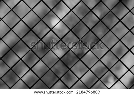 metal mesh,in the photo a mesh on a gray background.