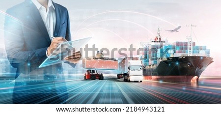 Smart Logistics Global Business and Warehouse Technology Management System Concept, Businessman using tablet control delivery network distribution import export, Double exposure future Transportation Royalty-Free Stock Photo #2184943121