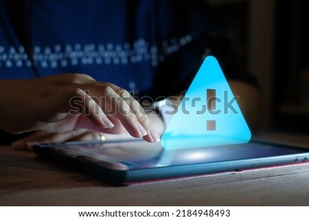 Server Not Found Error Danger Caution Warning Concept. Businessman using computer laptop with triangle caution warning sing for notification error and maintenance concept. Royalty-Free Stock Photo #2184948493