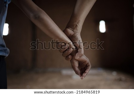 trafficking concept, child was a victim of human trafficking, human rights violations, missing kidnapped Royalty-Free Stock Photo #2184965819