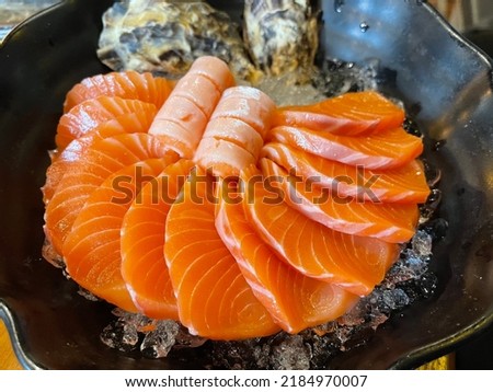 Salmon sashimi, large pieces, juicy, tender, delicious, melts in your mouth.