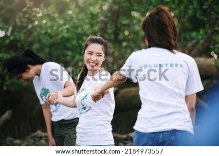 Asian volunteer help concept,show teamwork spirit togetherness, giving a helping hand to people. Royalty-Free Stock Photo #2184973557