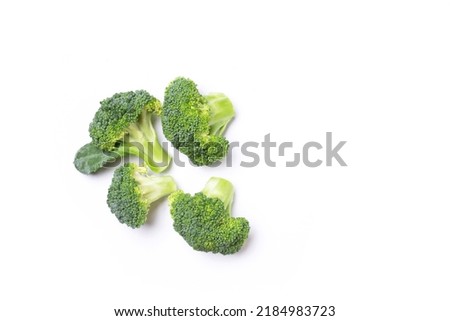 Fresh raw Broccoli isolated on white background, top view, flat lay.  Royalty-Free Stock Photo #2184983723
