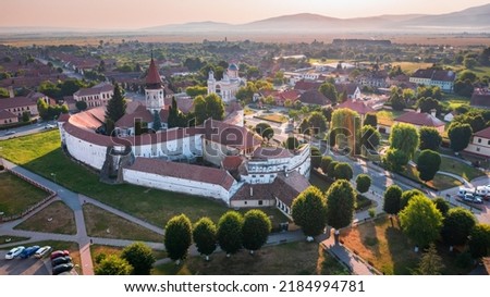 Prejmer, Romania. Aerial drone view of Prejmer fortified Church. UNESCO world heritage site in Transylvania. Royalty-Free Stock Photo #2184994781