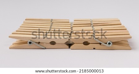 set of wooden clothespins isolated on white background