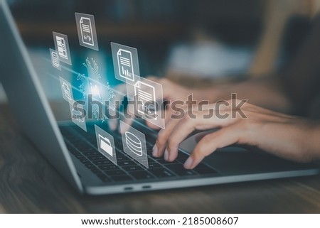 Virtual Intelligence (Ai) documents search concept. Hands woman typing keyboard on laptop in office. Businesswoman select report from company database. security system, Internet cloud connection. Royalty-Free Stock Photo #2185008607