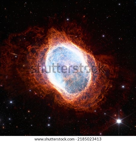 Southern Ring Nebula. Space collage from newest cosmic telescope. James webb telescope research of galaxies. Landscapes of Deep space. JWST. Elements of this image furnished by NASA. Royalty-Free Stock Photo #2185023413