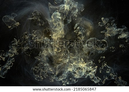 Liquid fluid art abstract background. Dark multicolored smoke dancing acrylic paints underwater, space ocean, universe explosion