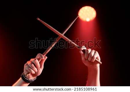 Close-up of the hands of a drummer who beats out the rhythm Royalty-Free Stock Photo #2185108961