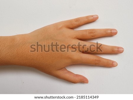 Female back of the hand isolated on white