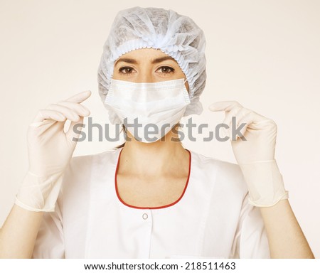 young pretty woman doctor with stethoscope close up