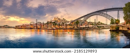 Famous bridge Ponte dom Luis above old town of Porto at river Duoro, Portugal Royalty-Free Stock Photo #2185129893