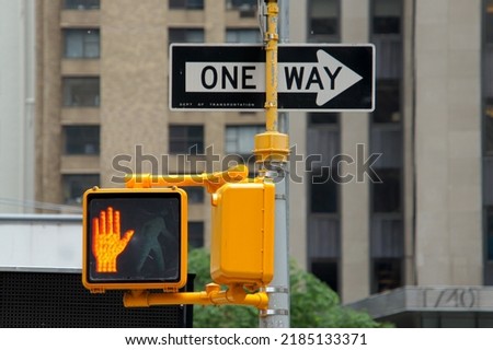 New York one-way road sign, but paused