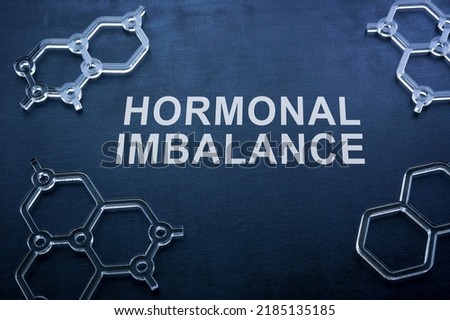 Hormonal imbalance on the blackboard and chemical models. Royalty-Free Stock Photo #2185135185