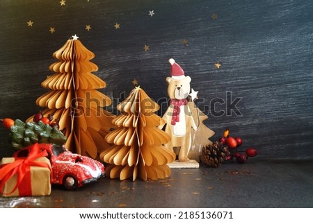 Paper and wood Christmas tree decorations, ethical holidays         